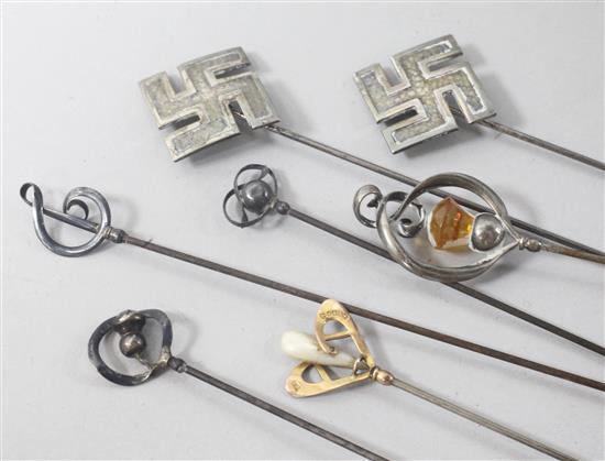 Seven assorted Charles Horner hatpins including one 9ct gold.